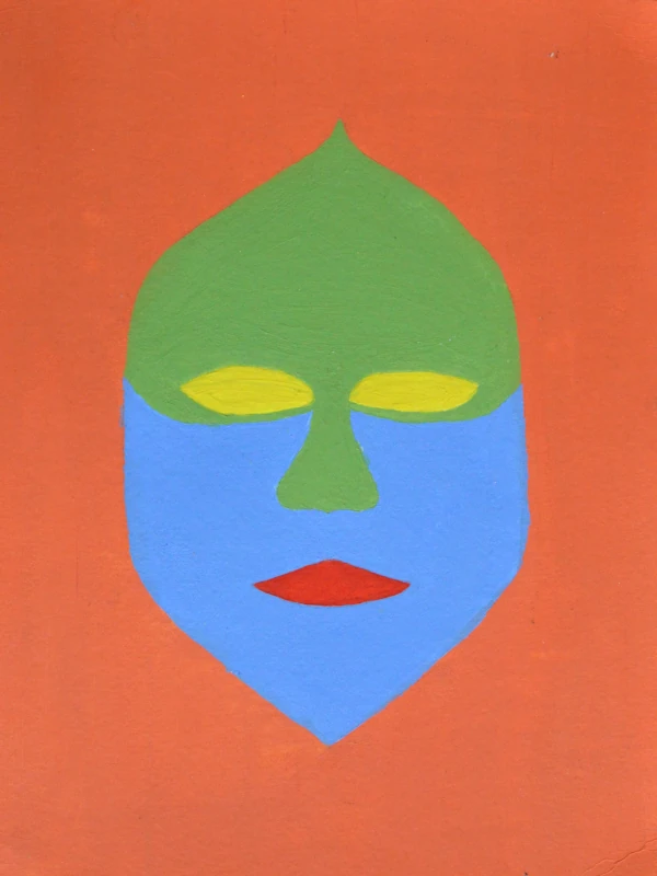 Mask painted in several differently colored blocks